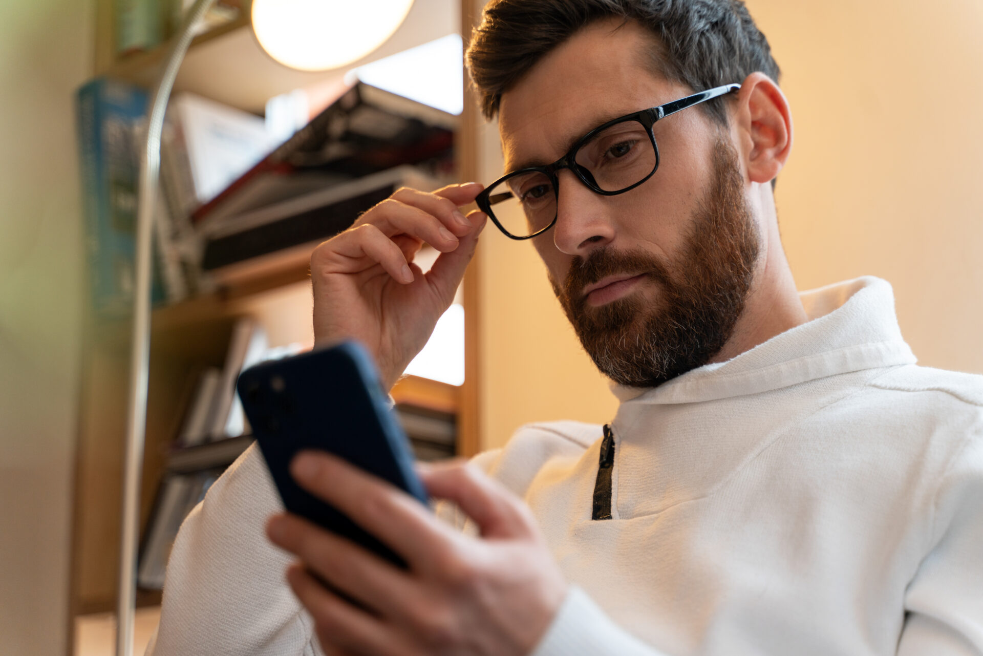 concentrated guy wearing glasses for vision in hom 2026 01 05 06 07 21 utc